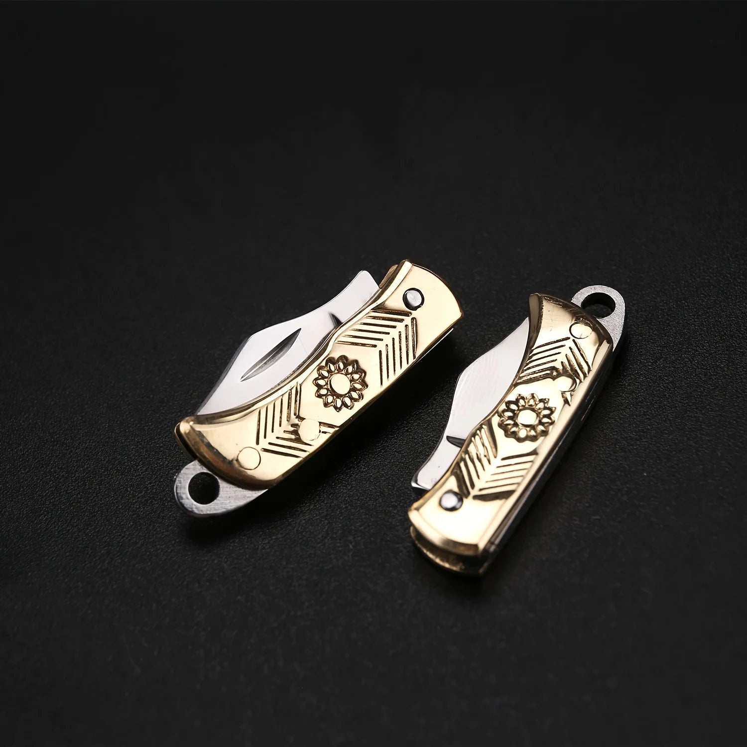 Tiny compact folding pocket knife with stainless steel blade, keychain attachment, lightweight and durable