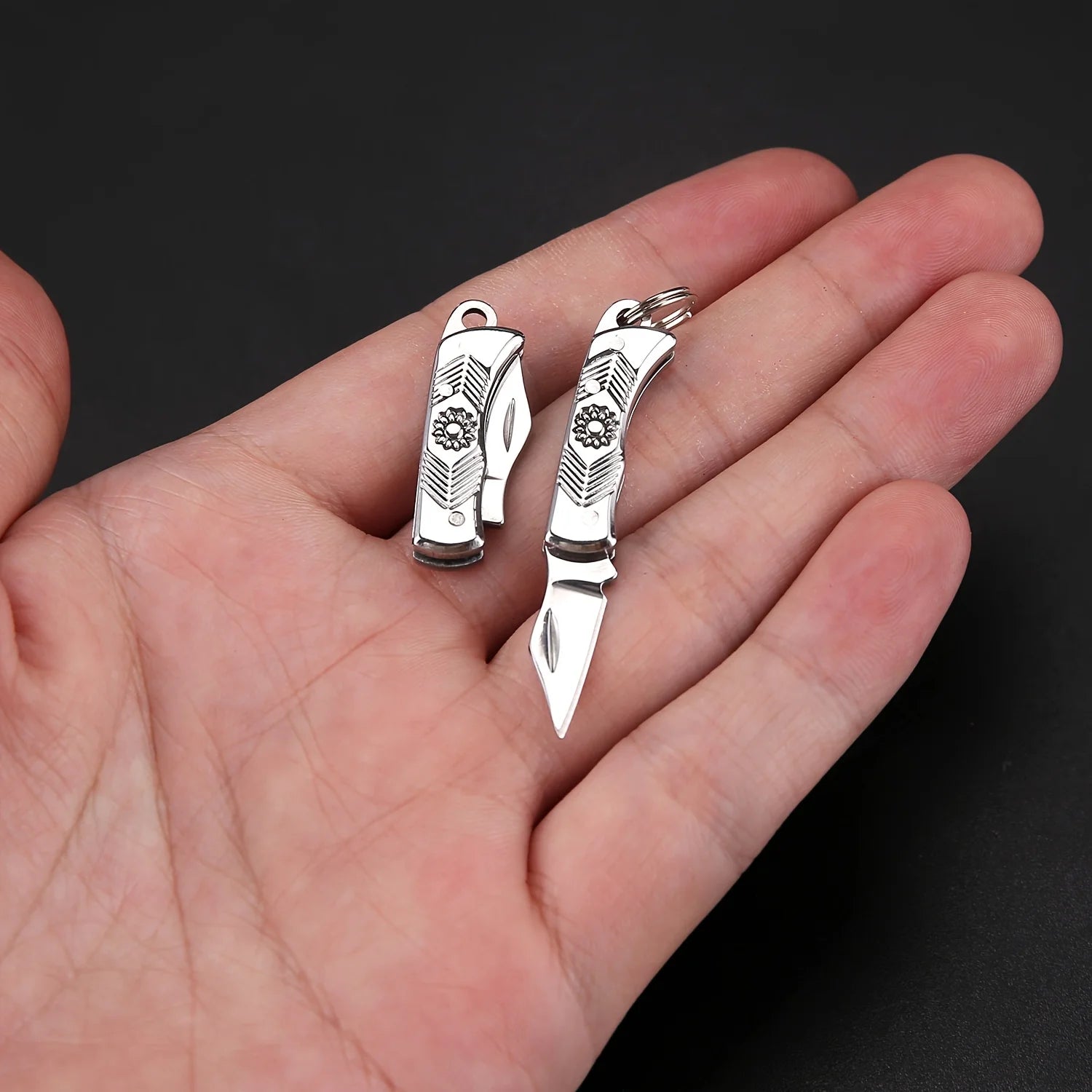Tiny compact folding pocket knife with stainless steel blade, keychain attachment, lightweight and durable